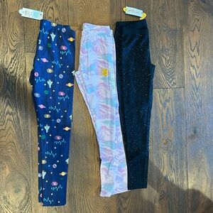 Three pairs of girls leggings